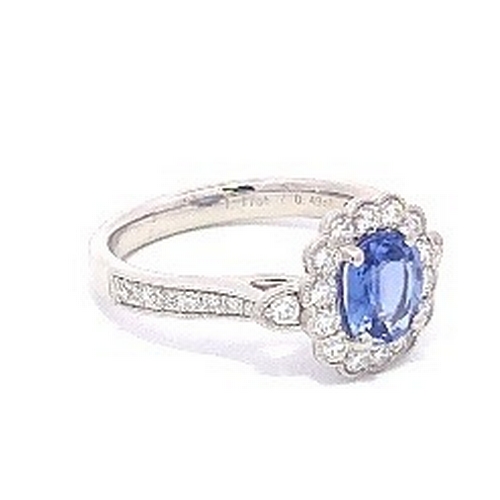 77 - A Platinum natural Blue Sapphire and Diamond Ring. Blue sapphire - 1.17ct. Diamond - 0.49ctw. Size M... 