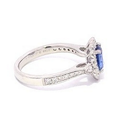 77 - A Platinum natural Blue Sapphire and Diamond Ring. Blue sapphire - 1.17ct. Diamond - 0.49ctw. Size M... 