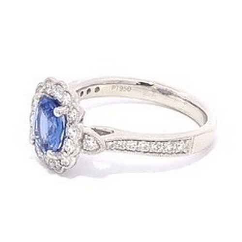 77 - A Platinum natural Blue Sapphire and Diamond Ring. Blue sapphire - 1.17ct. Diamond - 0.49ctw. Size M... 
