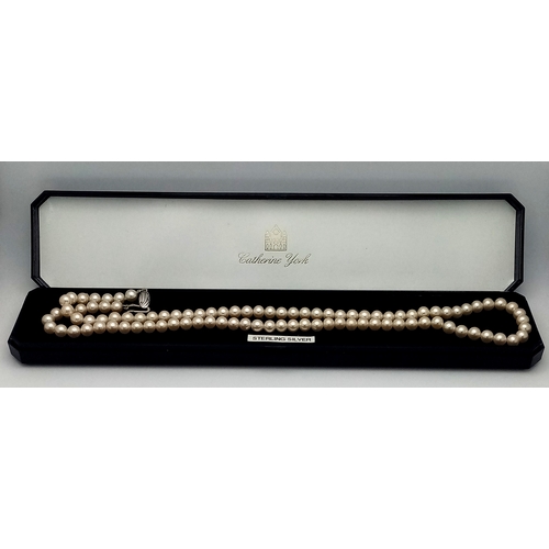 1031 - A Vintage Pearl Necklace with Silver Clasp. 56cm.