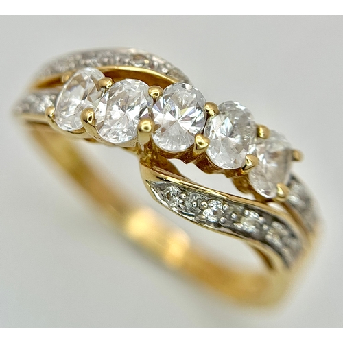 1149 - A 14K Yellow Gold White Zircon Crossover Ring. Bright stones. Size Q. 3.25g. Ref: 639121