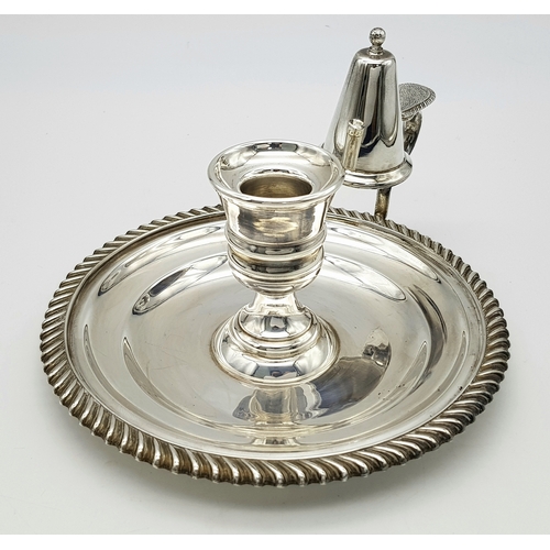 542 - A Mappin and Webb Sterling Silver Chamberstick Candle Holder. A round tray with decorative edge. Han... 