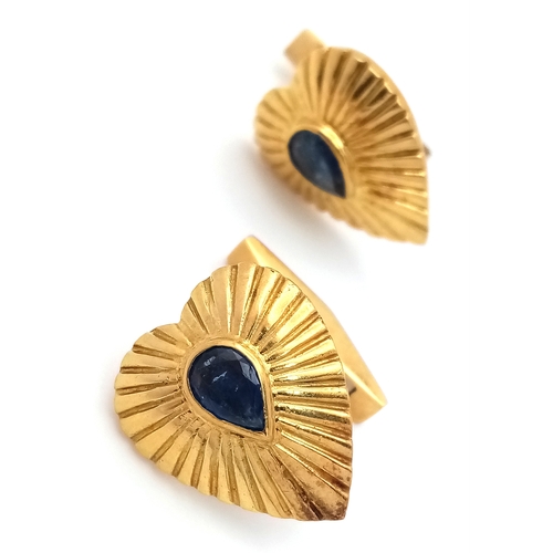 3 - A Pair of 18K Yellow Gold Heart-Shaped Cufflinks - Both having pear shaped set sapphires - c.1.2ctw.... 