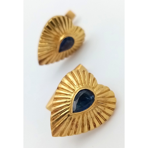 3 - A Pair of 18K Yellow Gold Heart-Shaped Cufflinks - Both having pear shaped set sapphires - c.1.2ctw.... 
