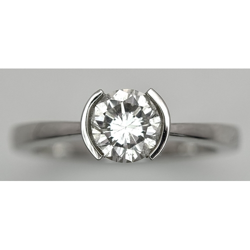 6 - AN 18K WHITE GOLD, DIAMOND SOLITAIRE RING. 0.75CT. 3.9G, SIZE M. P 133/135.