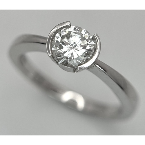 6 - AN 18K WHITE GOLD, DIAMOND SOLITAIRE RING. 0.75CT. 3.9G, SIZE M. P 133/135.