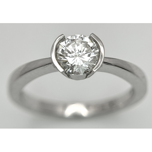 6 - AN 18K WHITE GOLD, DIAMOND SOLITAIRE RING. 0.75CT. 3.9G, SIZE M. P 133/135.