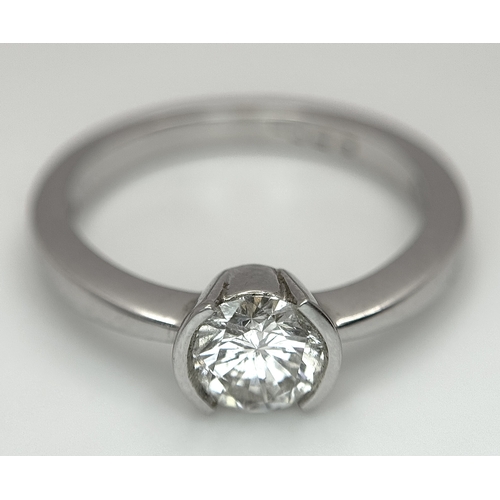 6 - AN 18K WHITE GOLD, DIAMOND SOLITAIRE RING. 0.75CT. 3.9G, SIZE M. P 133/135.