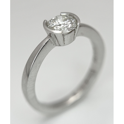 6 - AN 18K WHITE GOLD, DIAMOND SOLITAIRE RING. 0.75CT. 3.9G, SIZE M. P 133/135.