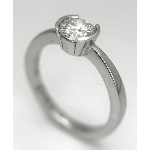 6 - AN 18K WHITE GOLD, DIAMOND SOLITAIRE RING. 0.75CT. 3.9G, SIZE M. P 133/135.