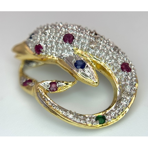 9 - A Gorgeous 18K Yellow Gold Gem-Set Dolphin Pendant. Diamond encrusted with emerald, ruby and sapphir... 