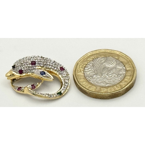 9 - A Gorgeous 18K Yellow Gold Gem-Set Dolphin Pendant. Diamond encrusted with emerald, ruby and sapphir... 