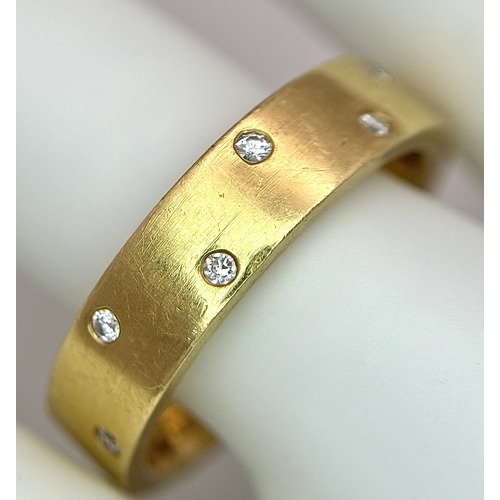 10 - AN 18K YELLOW GOLD, DIAMOND SET BAND RING. 9.9G, SIZE S. 10108