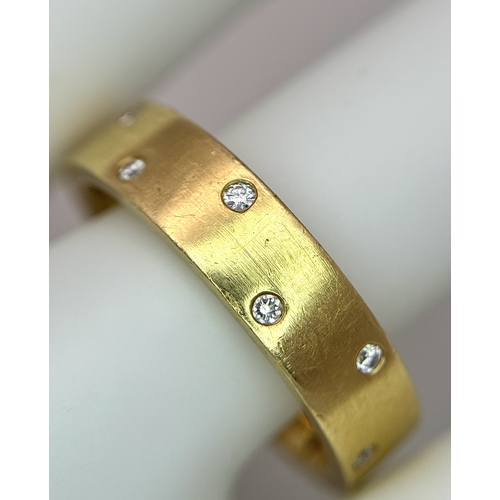 10 - AN 18K YELLOW GOLD, DIAMOND SET BAND RING. 9.9G, SIZE S. 10108