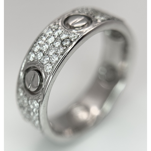20 - AN 18K WHITE GOLD, DIAMOND SET, SCREW DESIGN, BAND RING. 0.50 TCW, 10.1G, SIZE U. TAN 4007.