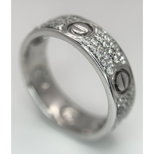 20 - AN 18K WHITE GOLD, DIAMOND SET, SCREW DESIGN, BAND RING. 0.50 TCW, 10.1G, SIZE U. TAN 4007.