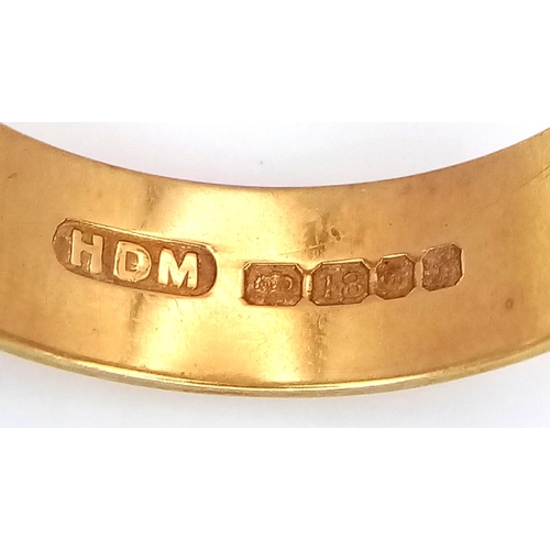 25 - An 18K Yellow Gold Band Ring. Full UK hallmarks. 6mm width. Size O. 6.35g.