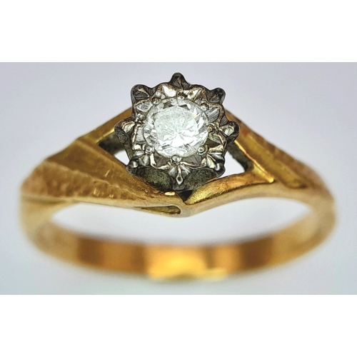 30 - An 18K Yellow Gold Diamond Solitaire Ring. Size M 1/2. 3.5g.