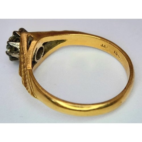 30 - An 18K Yellow Gold Diamond Solitaire Ring. Size M 1/2. 3.5g.