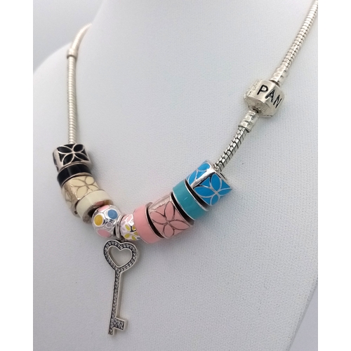 35 - Genuine PANDORA SILVER NECKLACE complete with 10 Enamelled SILVER CHARMS plus a SILVER KEY PENDANT. ... 