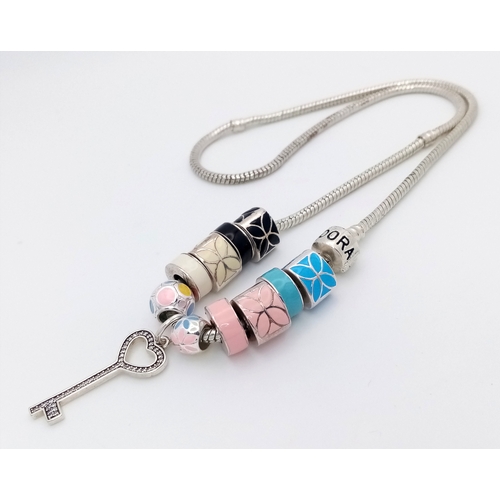35 - Genuine PANDORA SILVER NECKLACE complete with 10 Enamelled SILVER CHARMS plus a SILVER KEY PENDANT. ... 
