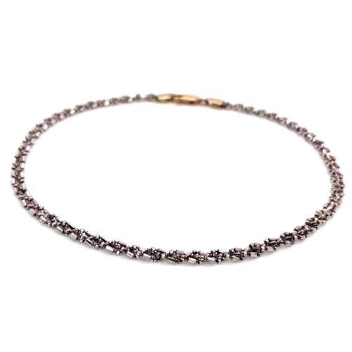 42 - Italian 9 CARAT WHITE and YELLOW GOLD ANKLE CHAIN bracelet. Fully hallmarked. Complete with jeweller... 