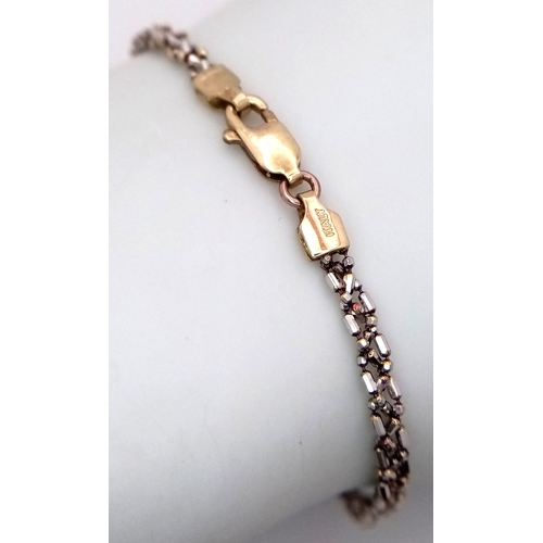 42 - Italian 9 CARAT WHITE and YELLOW GOLD ANKLE CHAIN bracelet. Fully hallmarked. Complete with jeweller... 