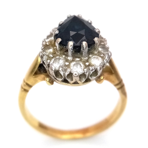 46 - An 18K Yellow Gold Diamond and Sapphire Ring. A 1.5ct pear-shaped sapphire with a 0.50ctw diamond su... 
