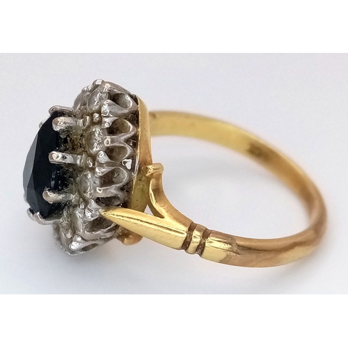 46 - An 18K Yellow Gold Diamond and Sapphire Ring. A 1.5ct pear-shaped sapphire with a 0.50ctw diamond su... 