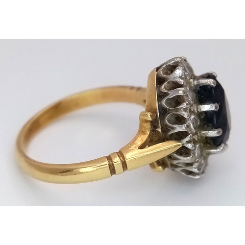 46 - An 18K Yellow Gold Diamond and Sapphire Ring. A 1.5ct pear-shaped sapphire with a 0.50ctw diamond su... 