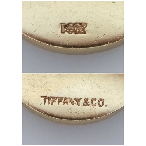 47 - A Pair of Tiffany and Co. 14K Yellow Gold Buttons. 20mm diameter. 13.92g total weight.