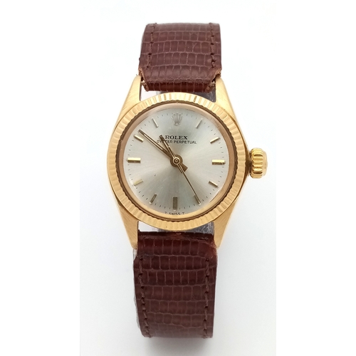 50 - A Vintage Rolex Oyster Perpetual Gold Cased Ladies Automatic Watch. Brown leather strap. Gold case -... 