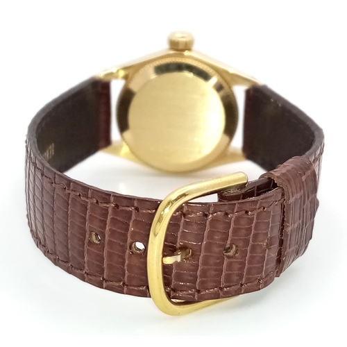 50 - A Vintage Rolex Oyster Perpetual Gold Cased Ladies Automatic Watch. Brown leather strap. Gold case -... 