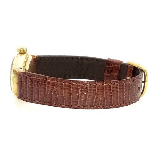 50 - A Vintage Rolex Oyster Perpetual Gold Cased Ladies Automatic Watch. Brown leather strap. Gold case -... 