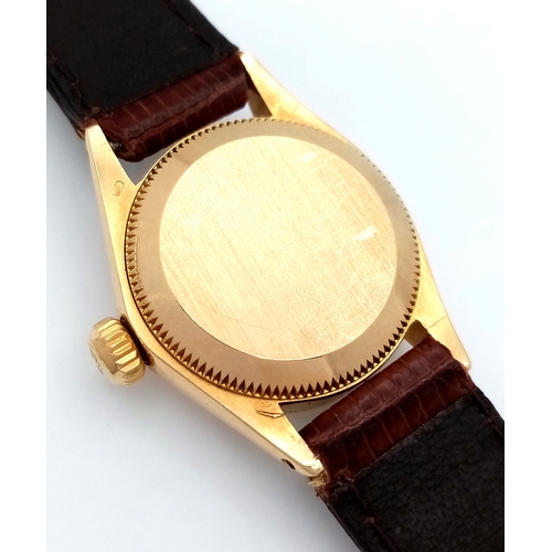 50 - A Vintage Rolex Oyster Perpetual Gold Cased Ladies Automatic Watch. Brown leather strap. Gold case -... 