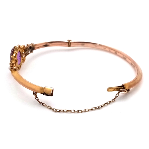 56 - Fabulous Vintage 9 CARAT GOLD BANGLE. Set with large Oval Cut AMETHYST and Seed PEARLS. Complete wit... 