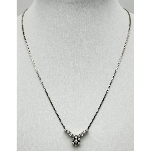 58 - An 18K White Gold Diamond Lavaliere Necklace - 0.90ctw of round brilliant cut diamonds. 7.3g. 42cm. ... 