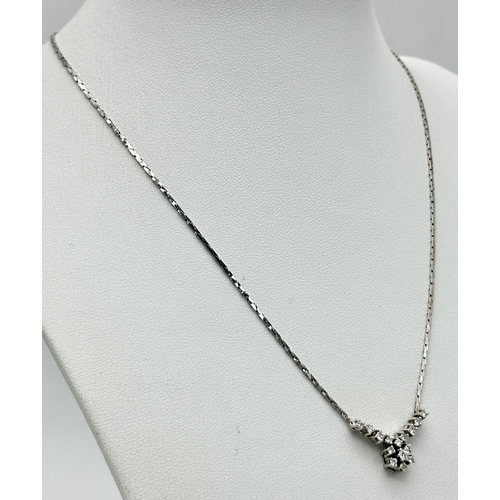58 - An 18K White Gold Diamond Lavaliere Necklace - 0.90ctw of round brilliant cut diamonds. 7.3g. 42cm. ... 