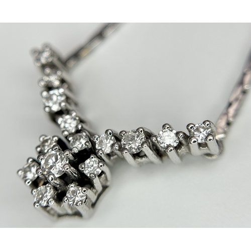 58 - An 18K White Gold Diamond Lavaliere Necklace - 0.90ctw of round brilliant cut diamonds. 7.3g. 42cm. ... 