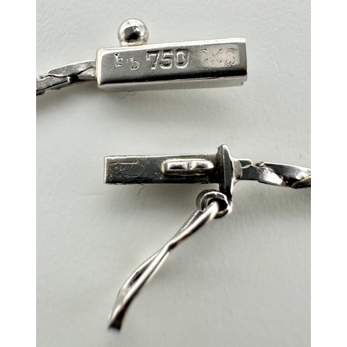 58 - An 18K White Gold Diamond Lavaliere Necklace - 0.90ctw of round brilliant cut diamonds. 7.3g. 42cm. ... 