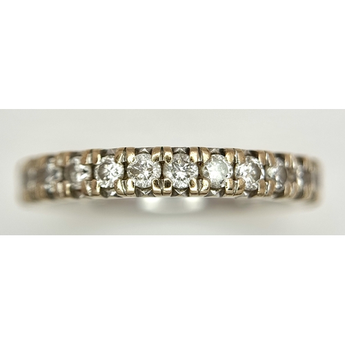 60 - An 18k Gold and Diamond Half Eternity Ring. 0.50ctw. Size L. 4.1g total weight.