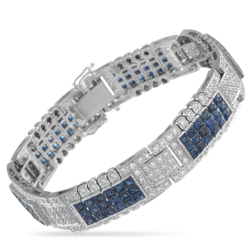 A Bellarri 18K White Gold 3.28ct Diamond and Sapphire Bracelet. Array of inset Diamonds totaling 3.28 carats. Sapphire accents with a total weight of 9.50 carats. Set in 18K White Gold, this bracelet measures 7 inches long and includes secure tab insert clasp closure. In estate condition and includes a gift box. Total weight: 49.5 grams. *This item is held at Cadmore USA Office in Pennsylvania, USA and will be shipped from there. Buyers will be responsible for direct shipping payments.*