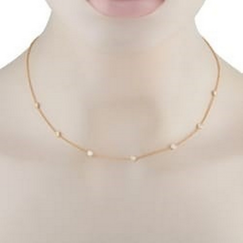 100 - An 18K Yellow Gold 1.05ct Diamond Station Necklace. A series of round-cut Diamonds with a total weig... 