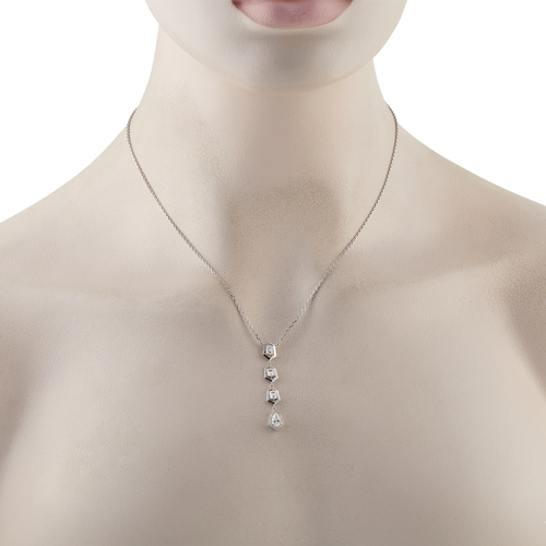 119 - An 18K White Gold 1.25ct Diamond Geometric Drop Necklace. A modern drop necklace in 18K white gold. ... 