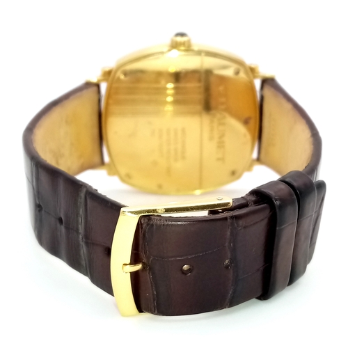62 - A Sophisticated Chaumet of Paris 18K Gold Dandy Automatic Gents Watch. Brown leather strap with 18K ... 
