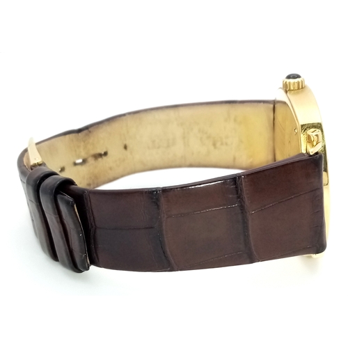 62 - A Sophisticated Chaumet of Paris 18K Gold Dandy Automatic Gents Watch. Brown leather strap with 18K ... 