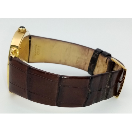 62 - A Sophisticated Chaumet of Paris 18K Gold Dandy Automatic Gents Watch. Brown leather strap with 18K ... 