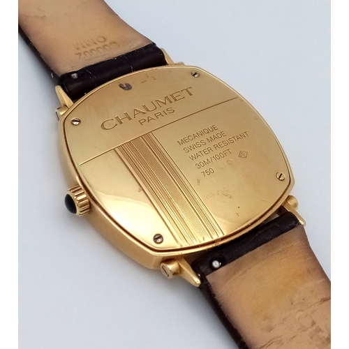62 - A Sophisticated Chaumet of Paris 18K Gold Dandy Automatic Gents Watch. Brown leather strap with 18K ... 