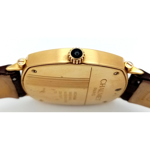 62 - A Sophisticated Chaumet of Paris 18K Gold Dandy Automatic Gents Watch. Brown leather strap with 18K ... 