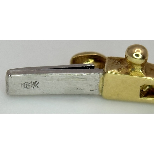 65 - An 18K Yellow Gold and Diamond Bangle. 1ctw of tapered baguette and round brilliant cut diamonds. Cl... 